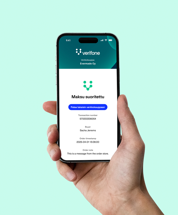 Hand holding a smartphone against a mint-green background showing a Verifone payment confirmation screen in Finnish reading "Maksu suoritettu" (payment completed), with transaction number, buyer name and a blue "Return to online store" button.